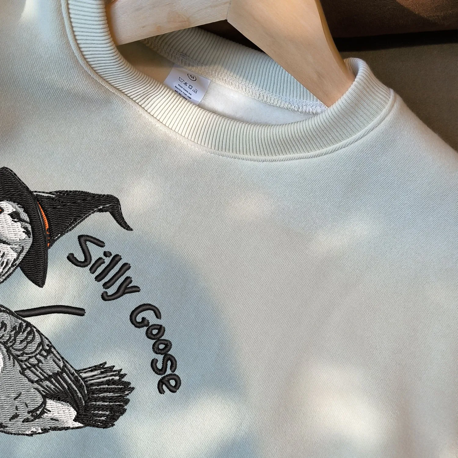 Teesdily | Halloween Goose Witch Embroidered Shirt, Silly Goose Embroidery Sweatshirt, Silly Goose On The Loose Shirt, Funny Goose Halloween Gifts